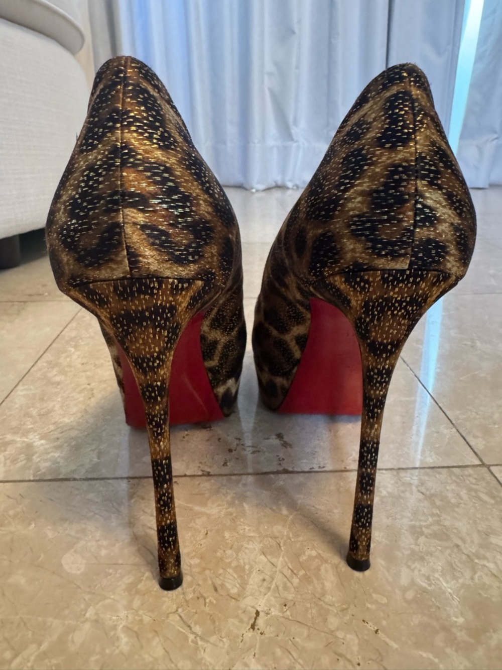 Christian Louboutin Leopard Print Pumps with Red Soles